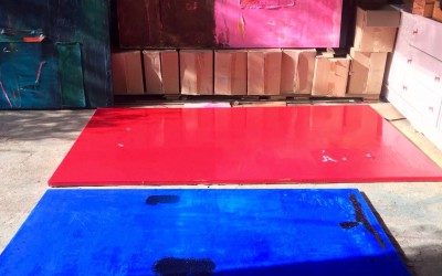 Paintings drying in the late afternoon sun